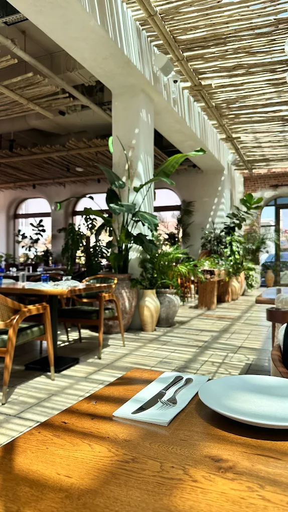 "Professionals collaboratively designing a sleek fit-out project in Dubai, emphasizing synergy and design execution"